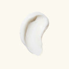 White cream swatch texture of intimate serum on light background