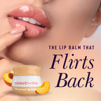 Peach flavored lip balm near glossy lips with small jar