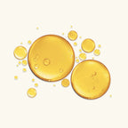 Golden oil droplets and two round gel discs with a glossy sheen