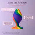 Rainbow silicone butt plug with flared base and curved tapered tip