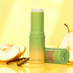 Green roll-on fragrance stick with matching cap and gradient base