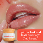 Peach flavored lip balm jar beside glossy lips