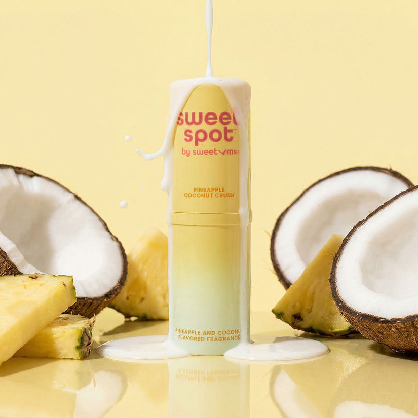 Solid fragrance stick in pale yellow with white cap, pineapple and coconut scent