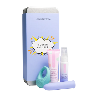 Gift set with blue box, teal C-ring vibrator, and two pink lotion bottles