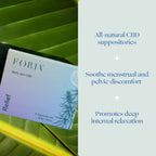 CBD suppository box on green leaves with benefits text panel