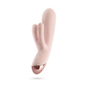 Elora vibrating massager in light pink with curved three-prong tip
