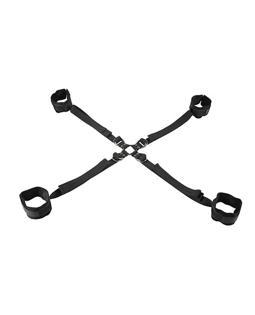 Restraint set with black straps and four cuffs, arranged in an X shape