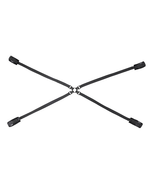 Restraint set with four black cuffs and a central metal connector with straps