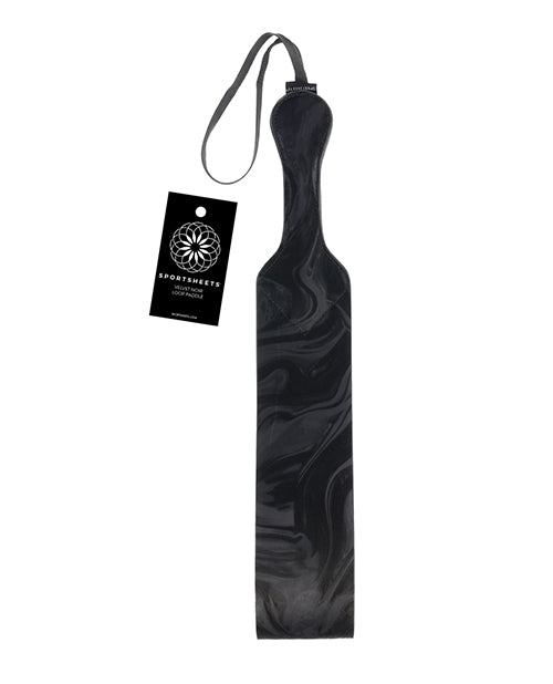 Velvet paddle with dark marbled pattern and loop handle, includes hanging tag