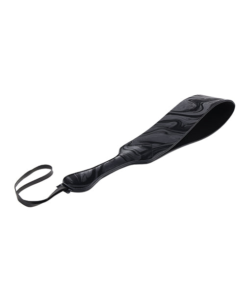 Velvet paddle with curved edge and dark marbled top panel, loop strap at end