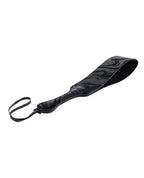 Velvet paddle with curved edge and dark marbled top panel, loop strap at end