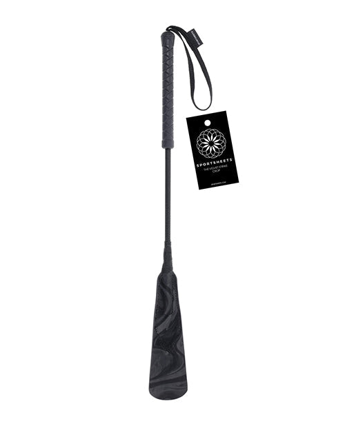 Black velvet strike crop with wrist loop strap and hanging tag