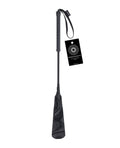 Black velvet strike crop with wrist loop strap and hanging tag