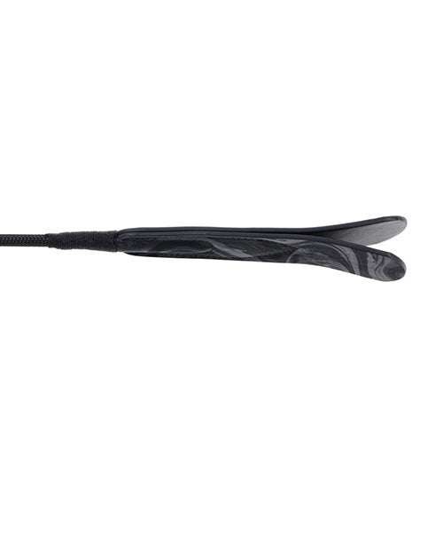 Black velvet strike crop close-up of padded oval head and textured grip