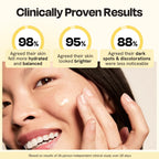 Superactive Serum serum on hand applying to woman's cheek, glossy skin