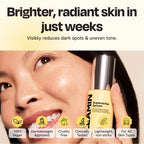 Superactive Serum yellow bottle held near woman's cheek for application