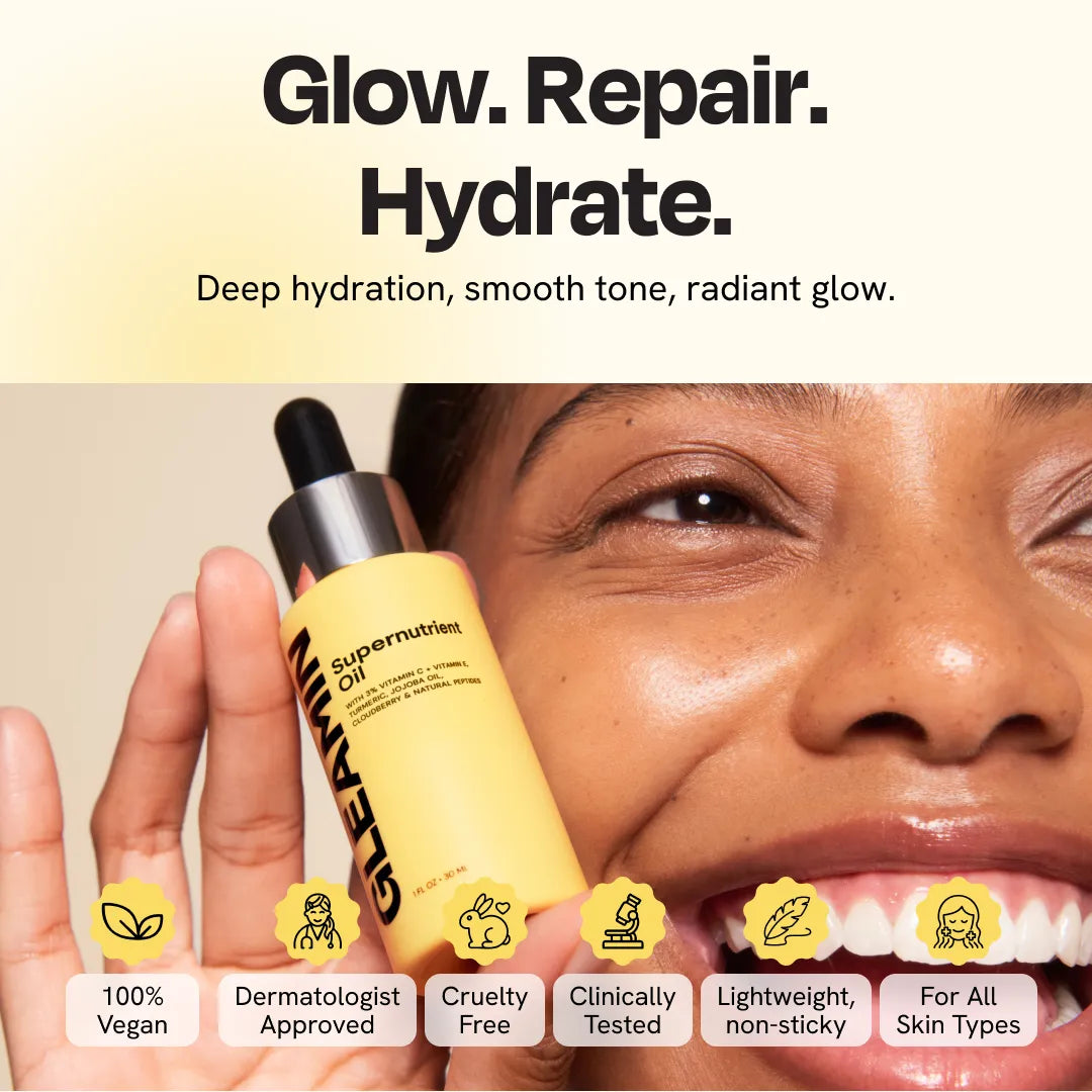 Skincare oil bottle held in hand with black dropper, yellow bottle and label