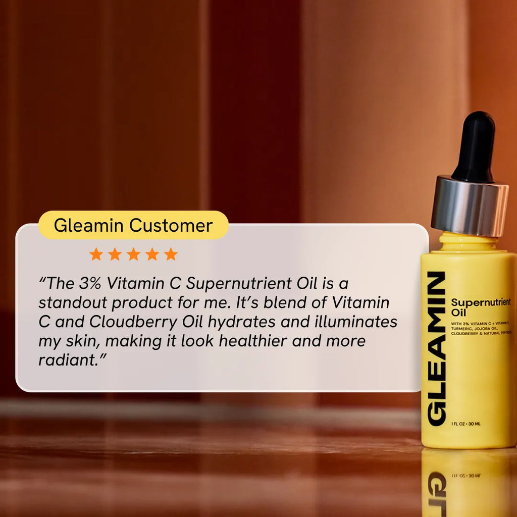 Gleamin Supernutrient Oil bottle with dropper, yellow label and glass