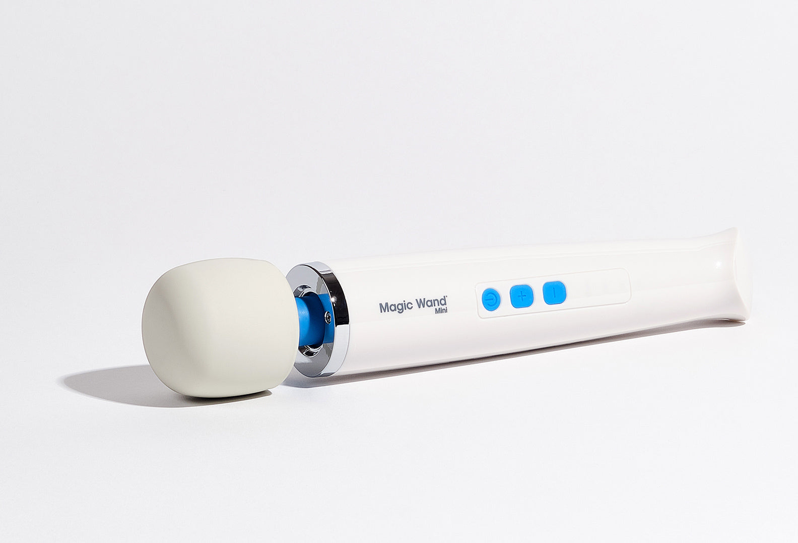 White magic wand close-up with round foam head, blue indicator lights