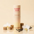 Golden vanilla solid fragrance stick with beige twist-up container