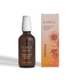 Body oil spray bottle and Vibriance box, dark amber liquid with white pump