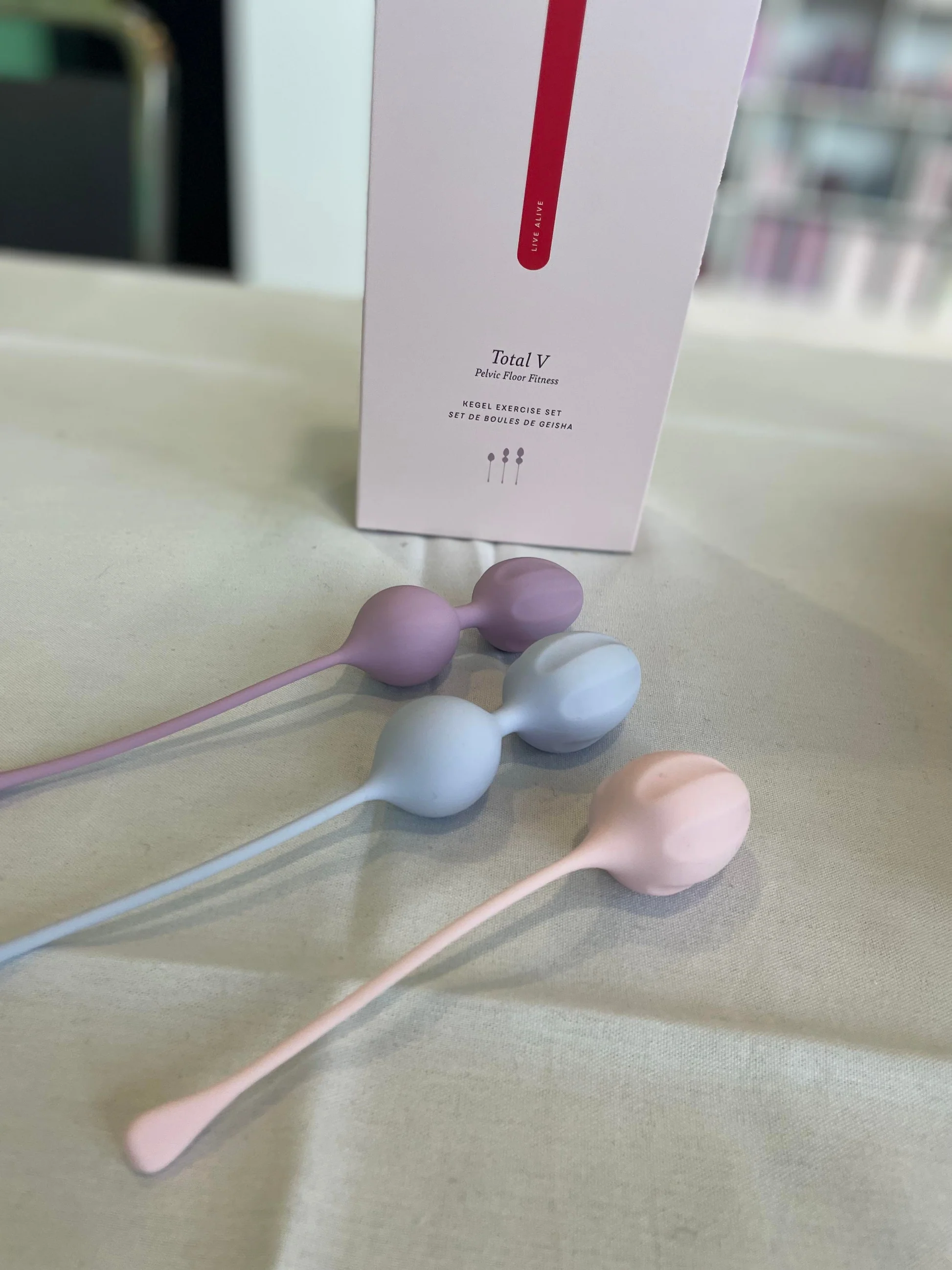 Pelvic floor fitness set of three silicone weights with long handles, lavender and light blue