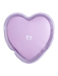 Lavender heart-shaped massager with small heart emblem on the front
