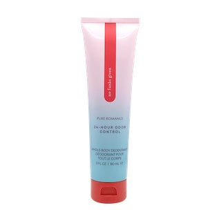 Deodorant tube with red cap and blue body, red logo label
