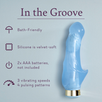 Light blue curved silicone massager, angled view, gold-toned base