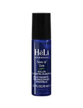 Small blue-labeled cosmetic spray bottle with black cap