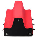 Bondage bench with red padded arms and black center pocket