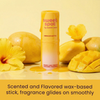 Scented wax-based stick in yellow container with wax cubes and hibiscus decor.