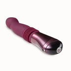 Pink thrusting vibe with ribbed grip and glossy dark base, power button on handle.
