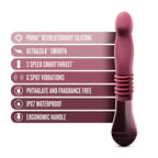 Pink thrusting vibe with ribbed midsection and ergonomic base, smooth silicone body.