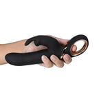 Black G-spot vibrator held in hand, curved arms and rose-gold motor ring