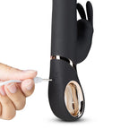 Black G-spot vibrator with charging port and rose-gold motor ring