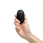 Black handheld remote with buttons and Cowgirl logo
