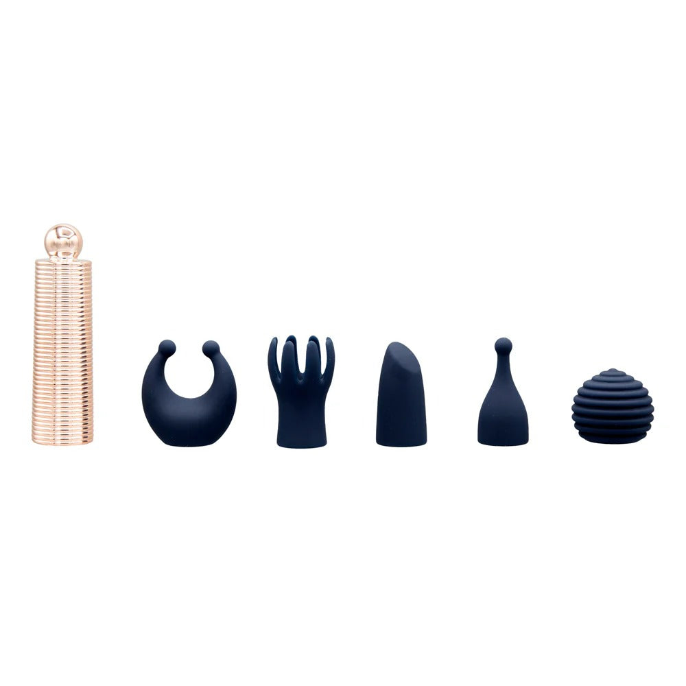 Mini massager set with rose-gold ribbed handle and six navy interchangeable attachments