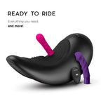 Black massage saddle with magenta and purple vibration attachments