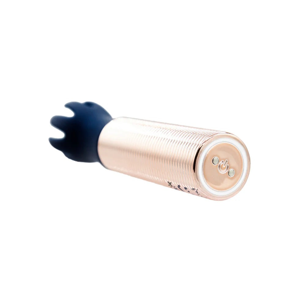 Mini massager handle with navy silicone prongs and clear ridged roller