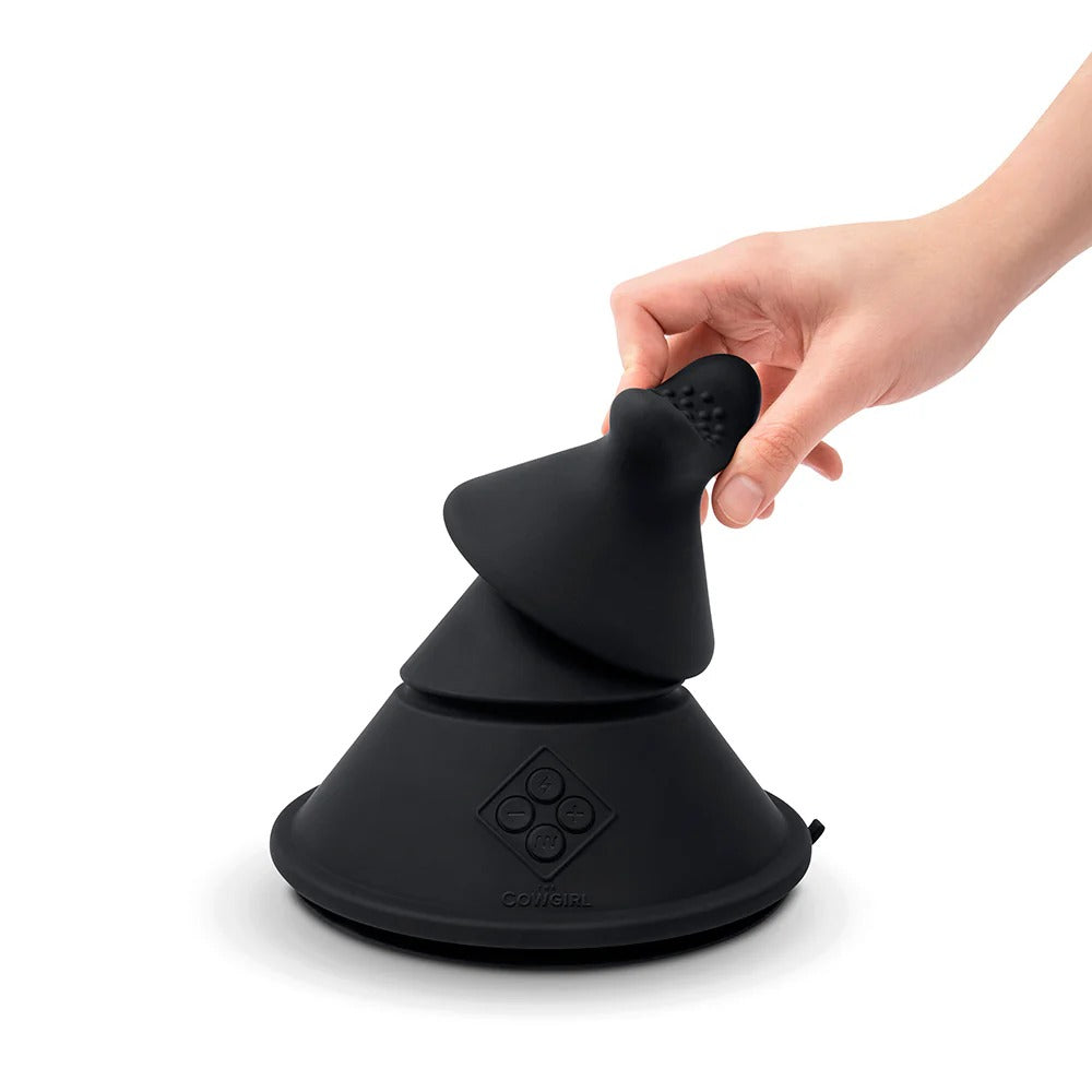 Black silicone cone pressed by hand, showing base control buttons