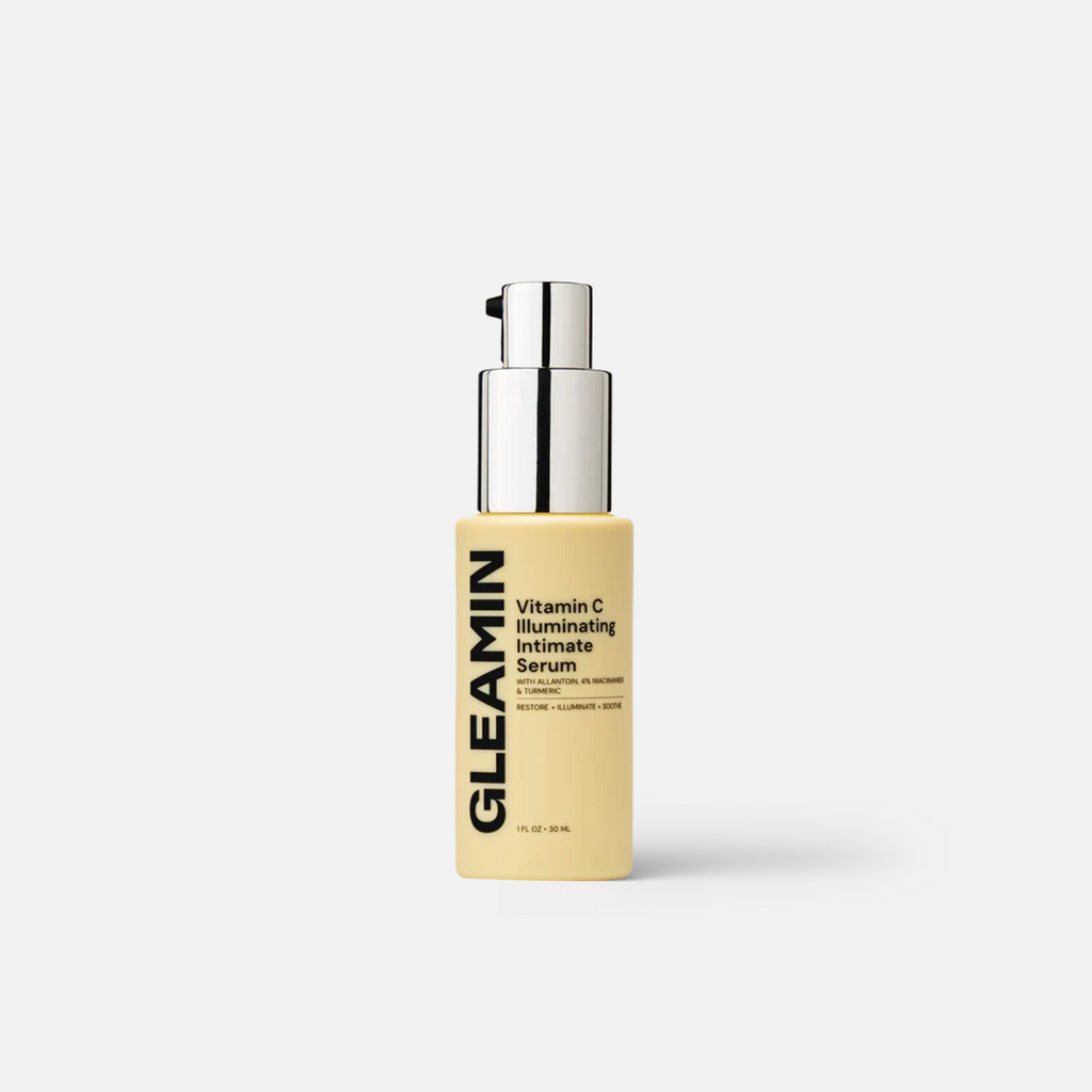 Illuminating intimate serum bottle with pump, gold-toned glass and clear label