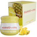 Pineapple-flavored lip balm jar, yellow balm, with Sweetums box and pineapple pieces