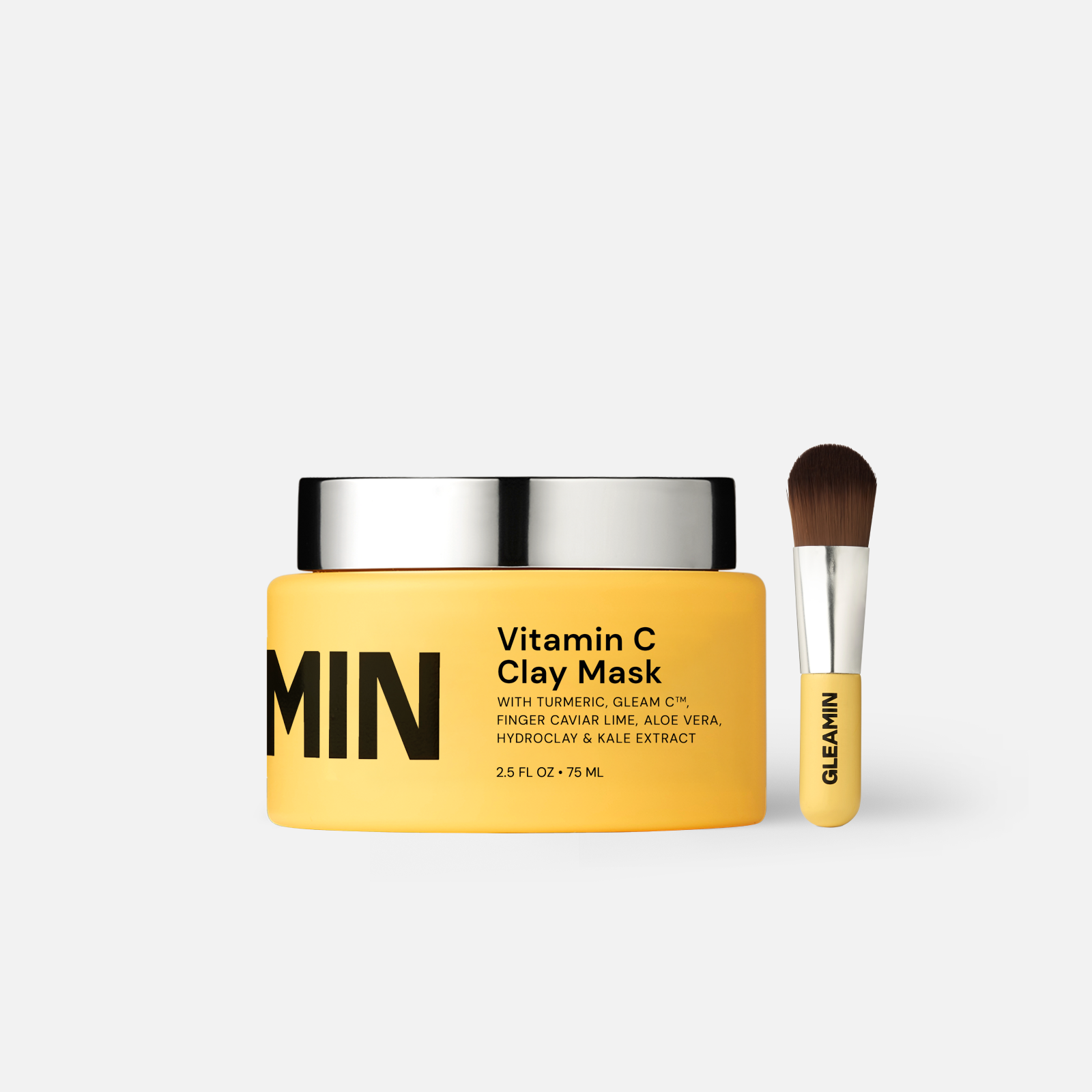 Vitamin C clay mask jar with silver lid and applicator brush
