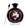 Edible body paint bottle with painting brush, dark maroon liquid