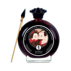 Edible body paint bottle with painting brush, dark maroon liquid
