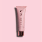 Dark mauve hand cream tube with ribbed cap and heart-flower logo
