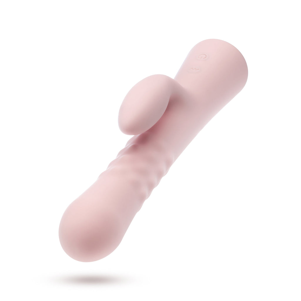 Pink silicone vibrator with smooth curved body and open oval opening